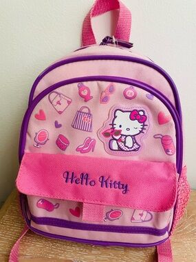 Hello Kitty-child backpack-pink & purple-Kitty surrounded by her glamour items
